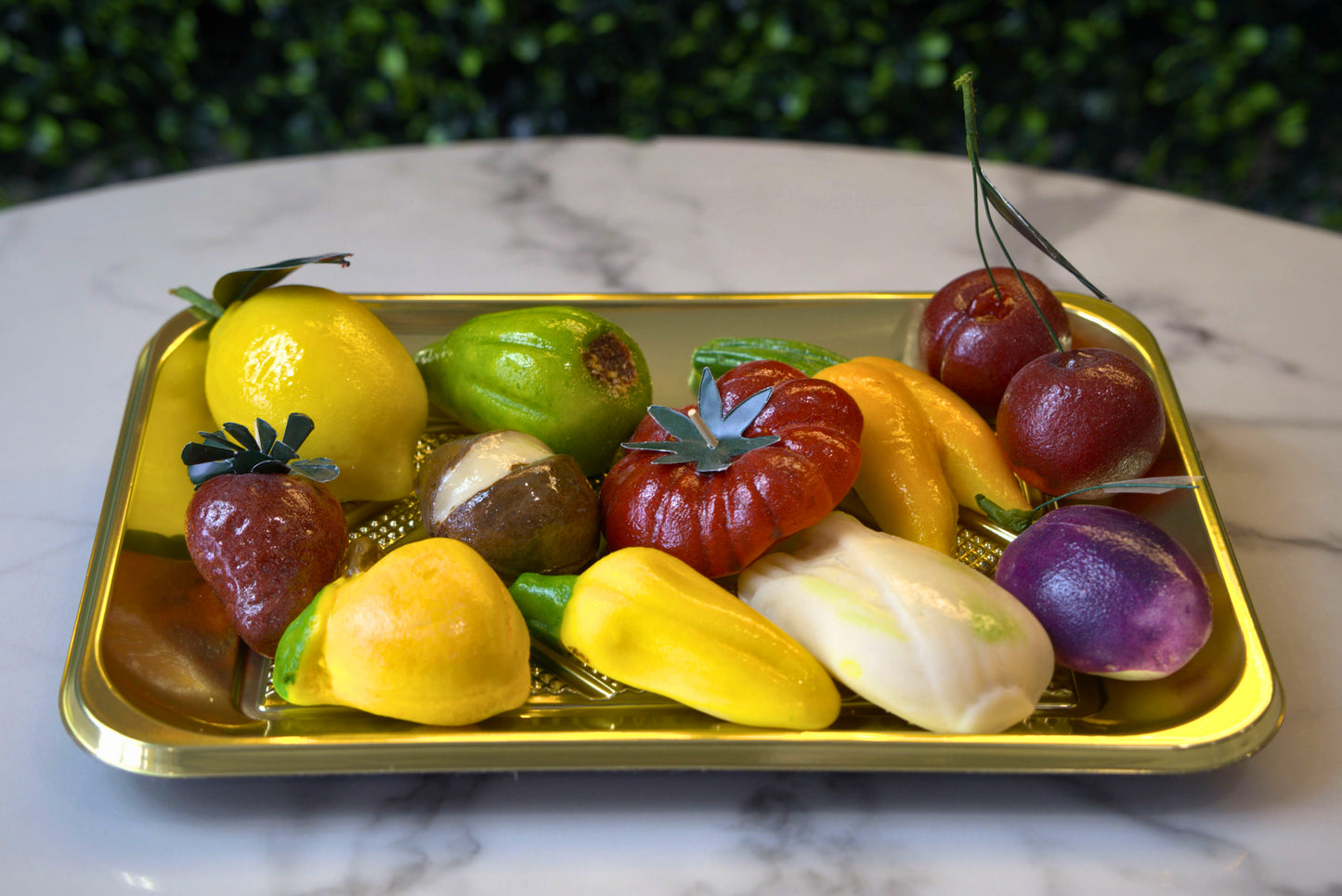 A variety of fruit shapes in marzipan made by La Roma Pastry Shop