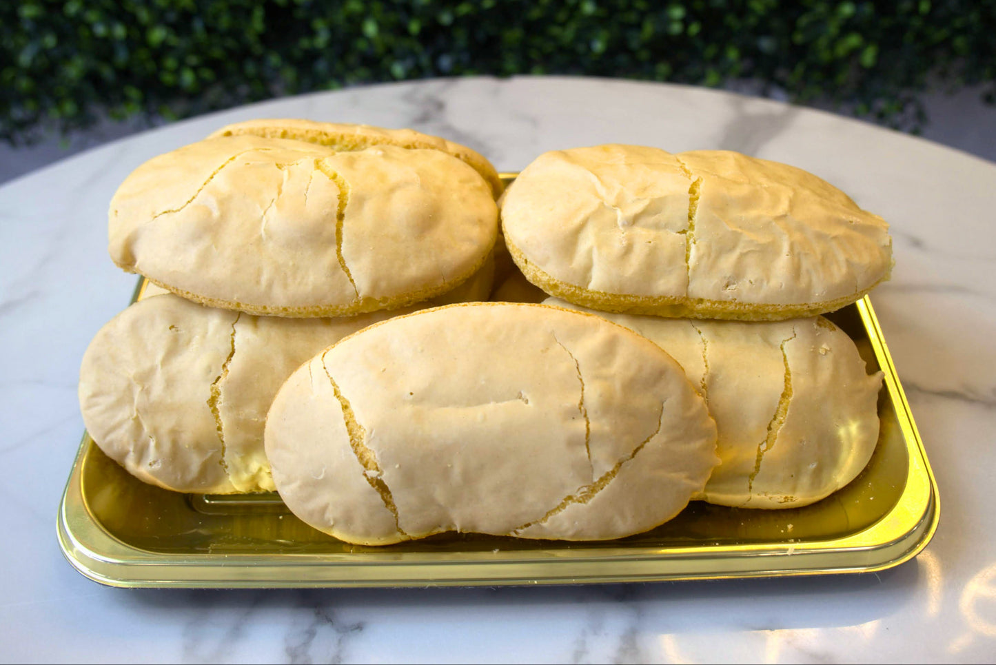 Gaze down upon a tray full of Savoiardi Cookies from La Roma Pastry Shop