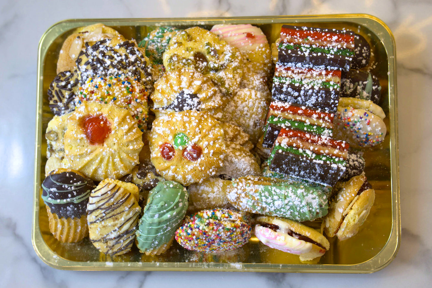 Overhead shot of a golden platter of Assorted Italian Butter Cookies made by La Roma Pastry Shop